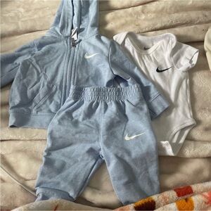 Nike Light Blue Tracksuit and White Bodysuit Set